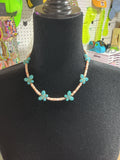Butterfly and pink shell necklace