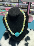 Beaded necklace with turquoise stone