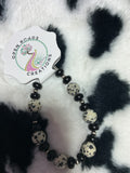 Dalmatian black onyx and sterling silver beads