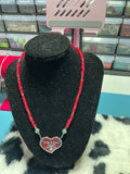 Upcycled heart charm necklace